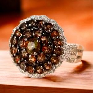 Jenipapo Andalusite, and White Zircon ring, size 7 1/4